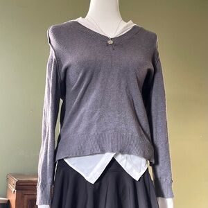 Gray V-Neck Sweater with Layered White Shirt